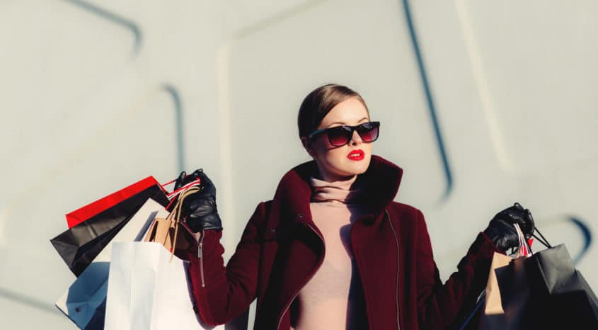 Woman with Couture shopping bags