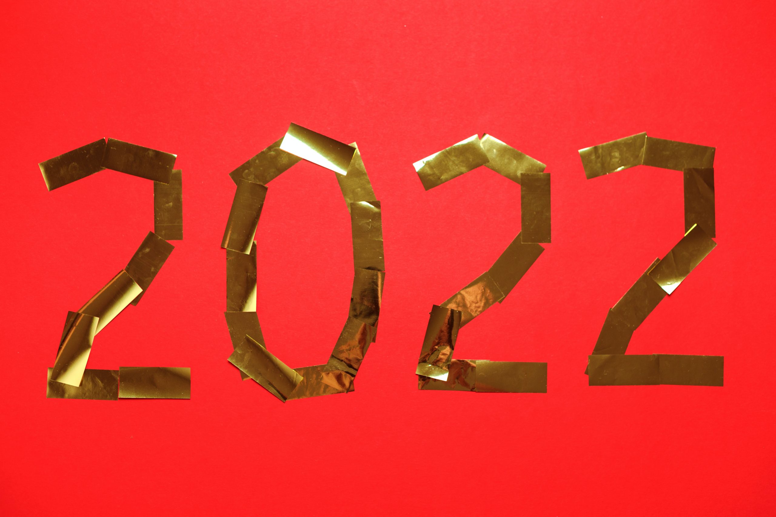 2022 written in gold on red background