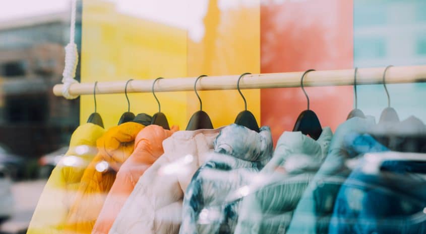 Clothes rail with coats hanging