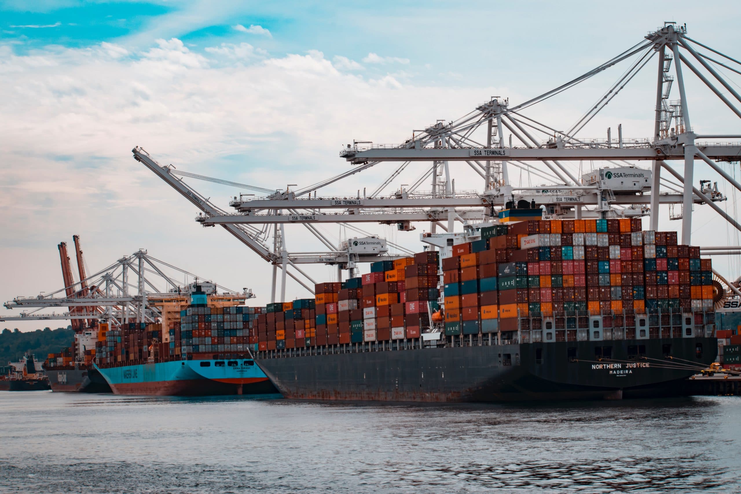 Container ships in port with cranes