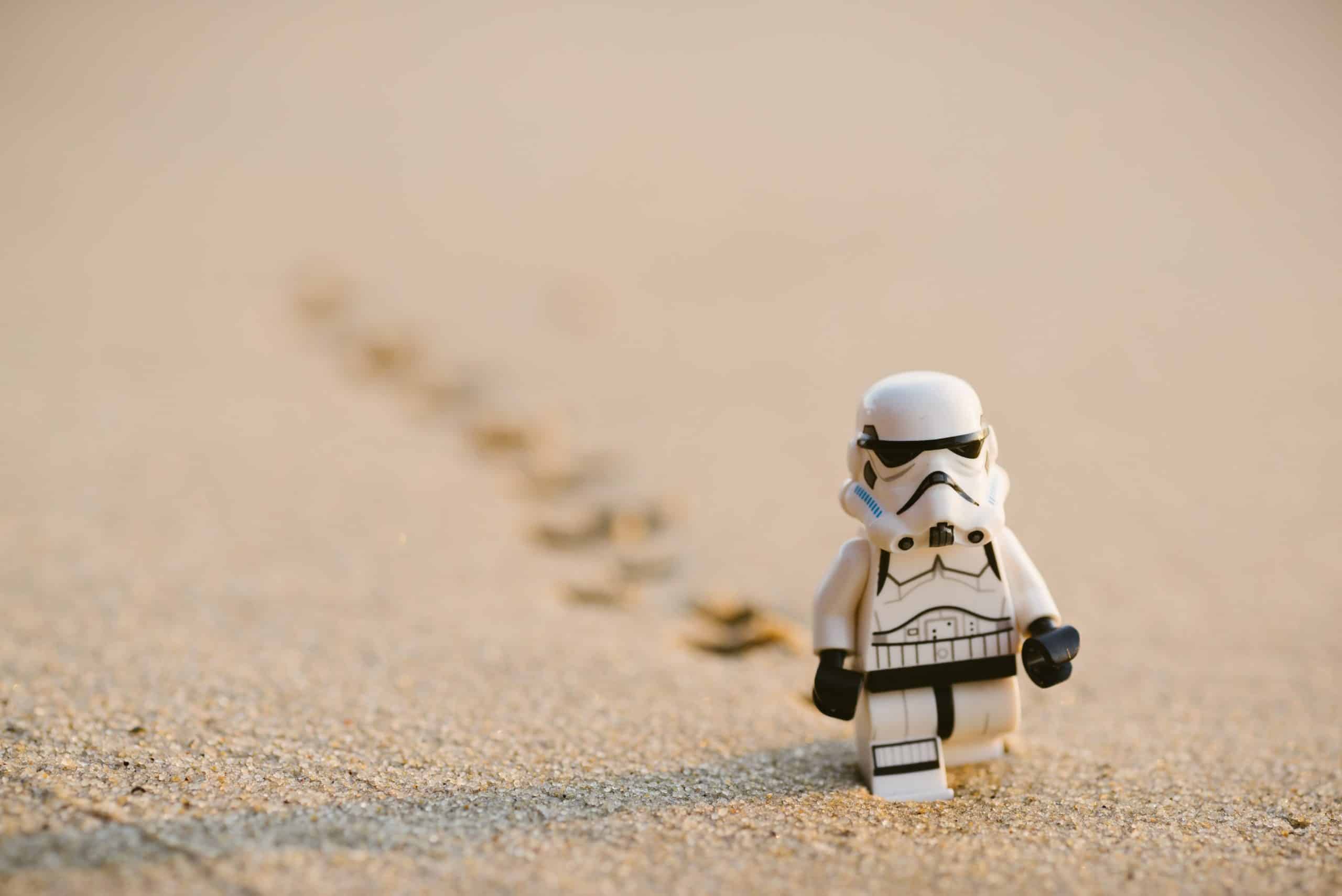 Lego stormtrooper on sandy ground