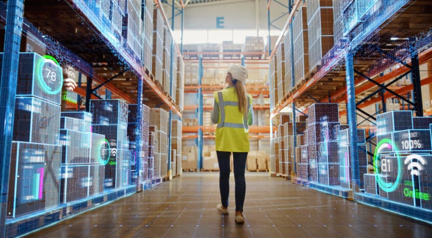 Futuristic Technology Retail Warehouse: Worker Doing Inventory W