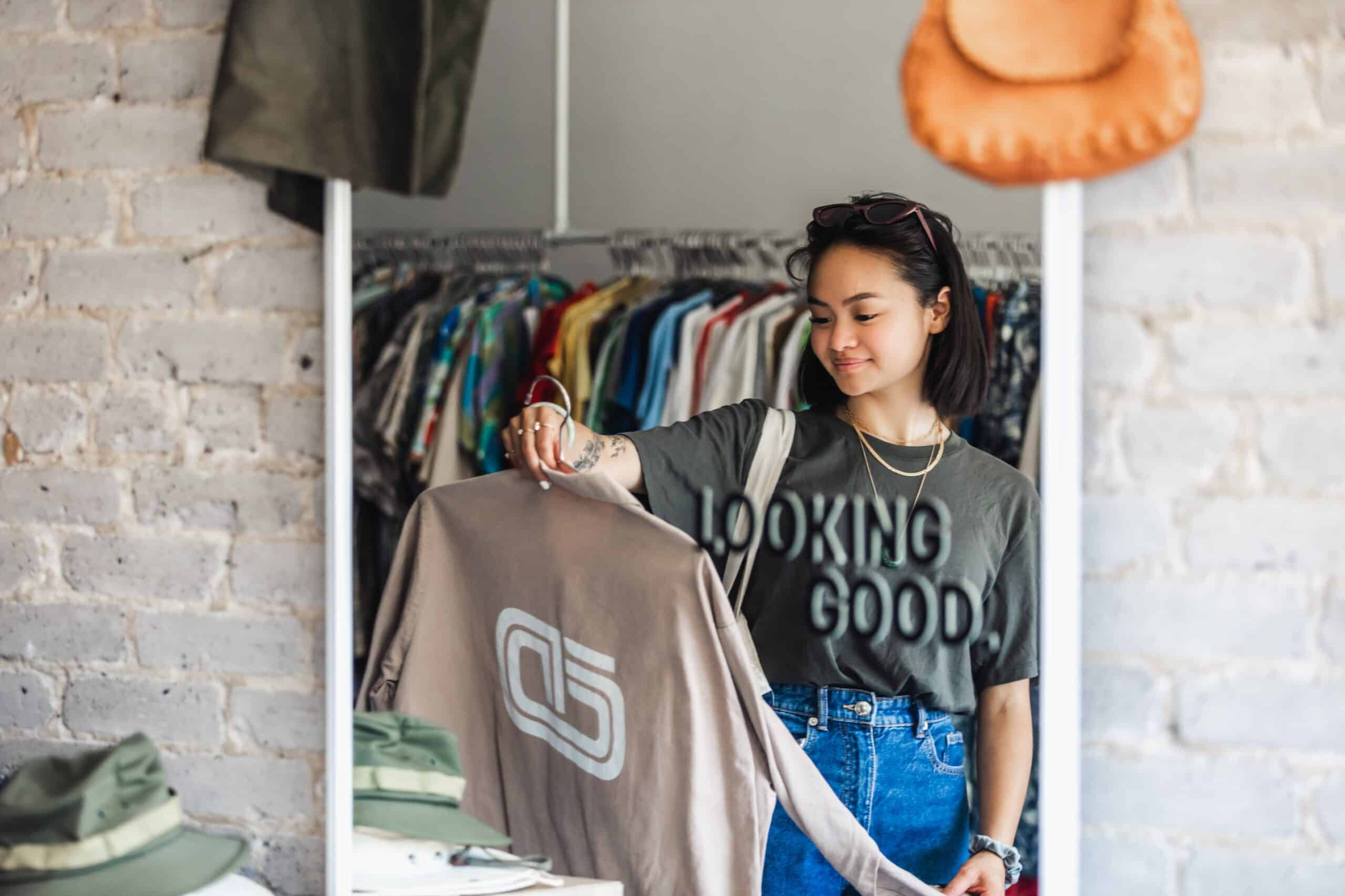 Mirror view of young shopper