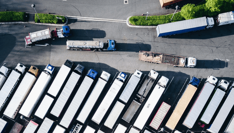 Aerial View of Truck Fleet at Logistics Hub