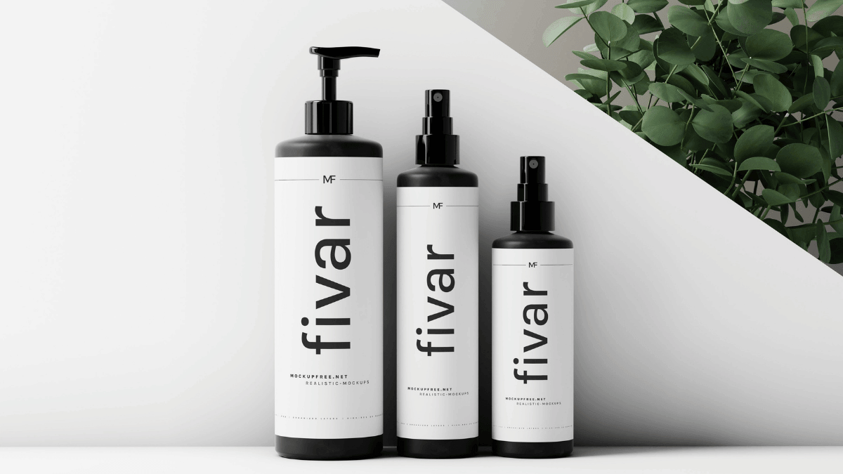 Three different-sized black and white skincare bottles grouped as a product bundle.